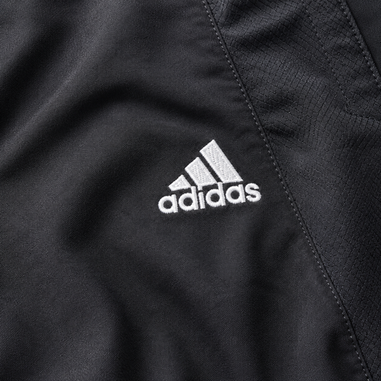 adidas Vintage Track Pants in Schwarz mit weißen 3-Streifen – Detailansicht