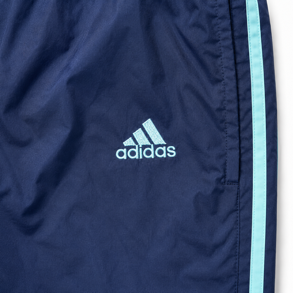adidas Vintage Track Pants in Navy mit mintfarbenen 3-Streifen – Detailansicht