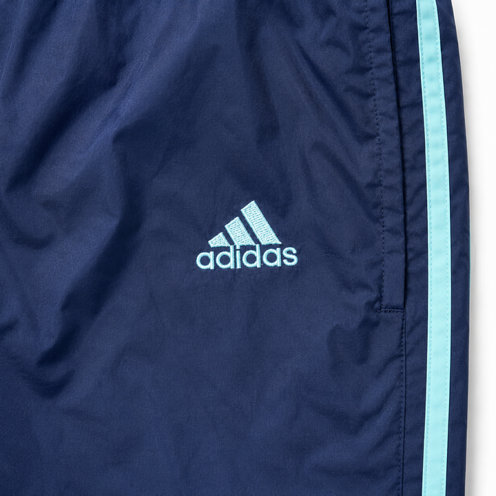 adidas Vintage Track Pants in Navy mit mintfarbenen 3-Streifen – Detailansicht